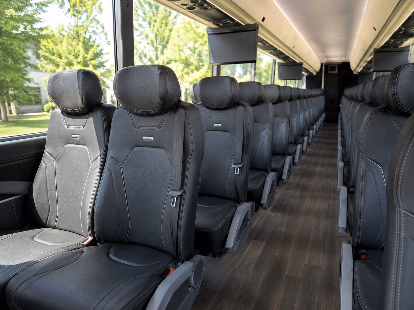 how trip distance and duration affect charter bus rental rates in detroit